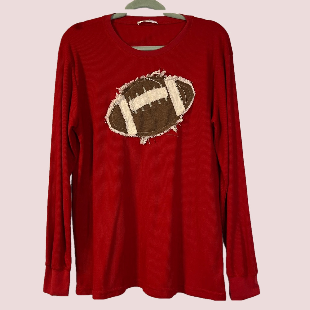 Red ribbed Appliqué (Football on Front)  Women’s shirt Size L.